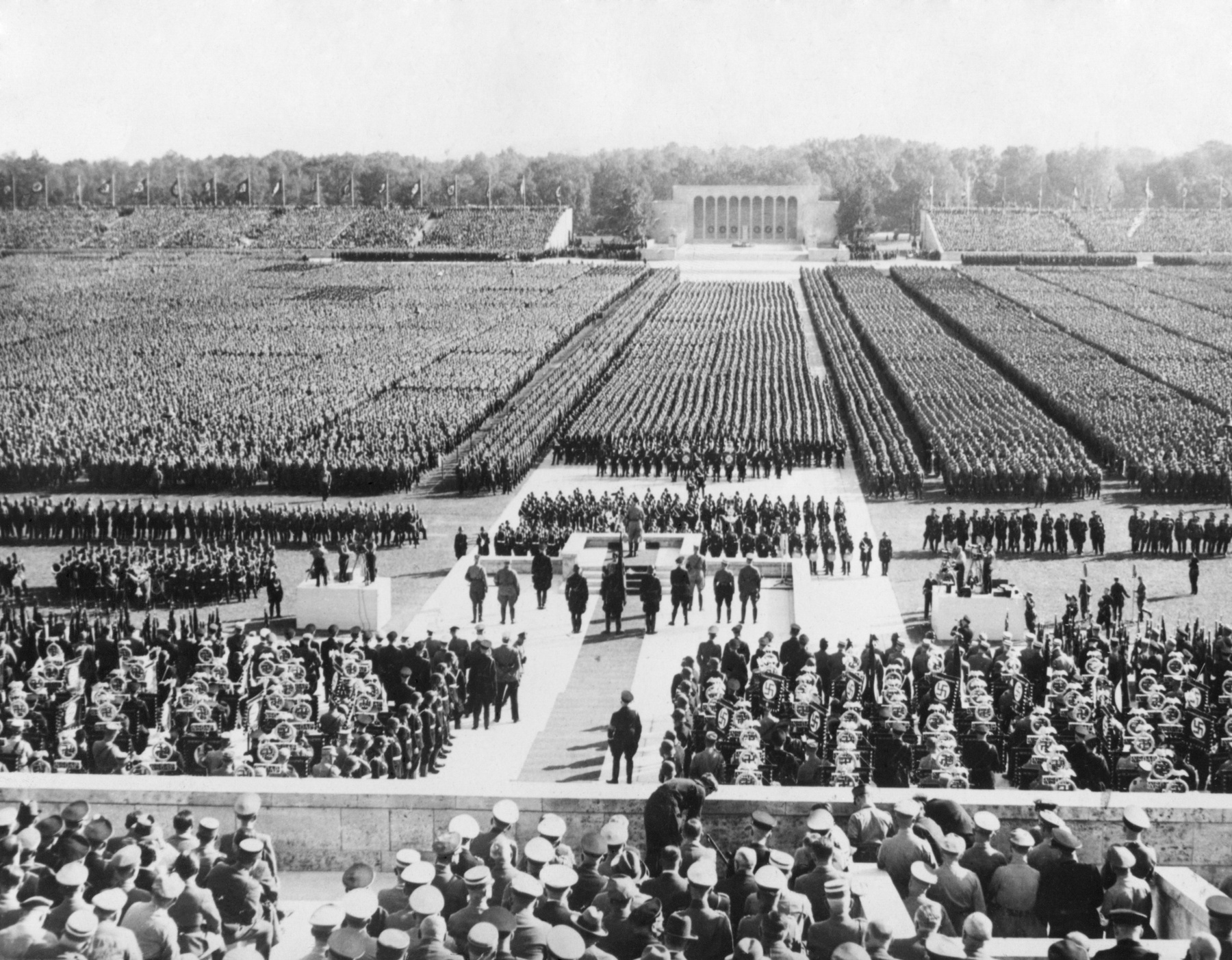 Ranks of the Nazi German army fill Zeppelin Field in Nuremberg. They are addressed by Hitler from a podium (center) during the Nazi Party Congress, Sept. 8, 1938. - (BSLOC_2014_14_10)